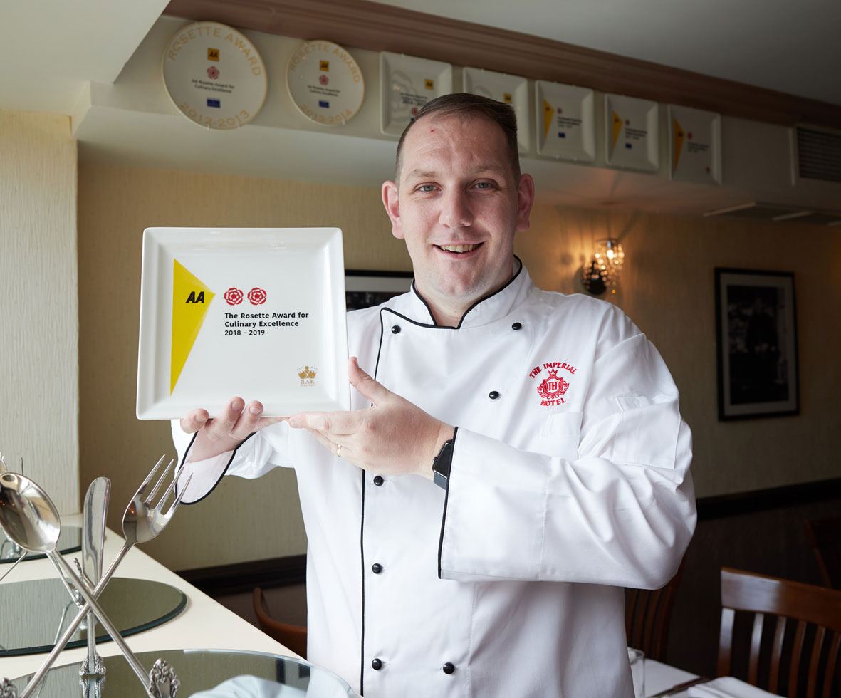 Daniel Lawrence with 2 AA Rosette Award